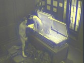 See what a security camera catches when two horny employees fuck hard in a coffin!