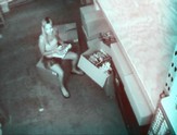 Very lusty blonde fingering her pussy caught in security cam